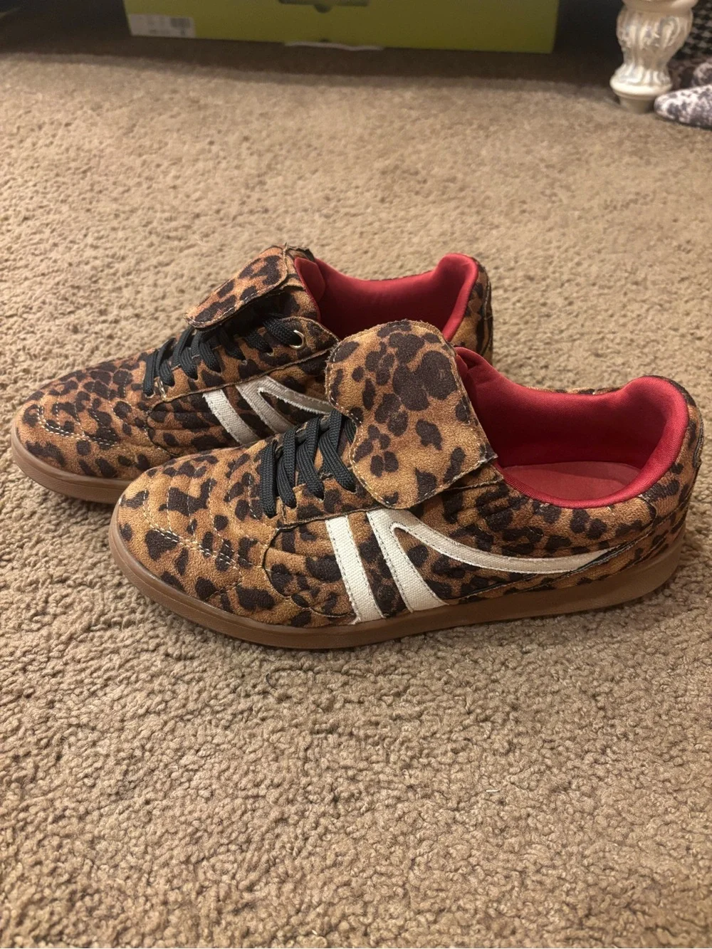 Steve Madden women’s Leopard Print Sneakers with Red Lining